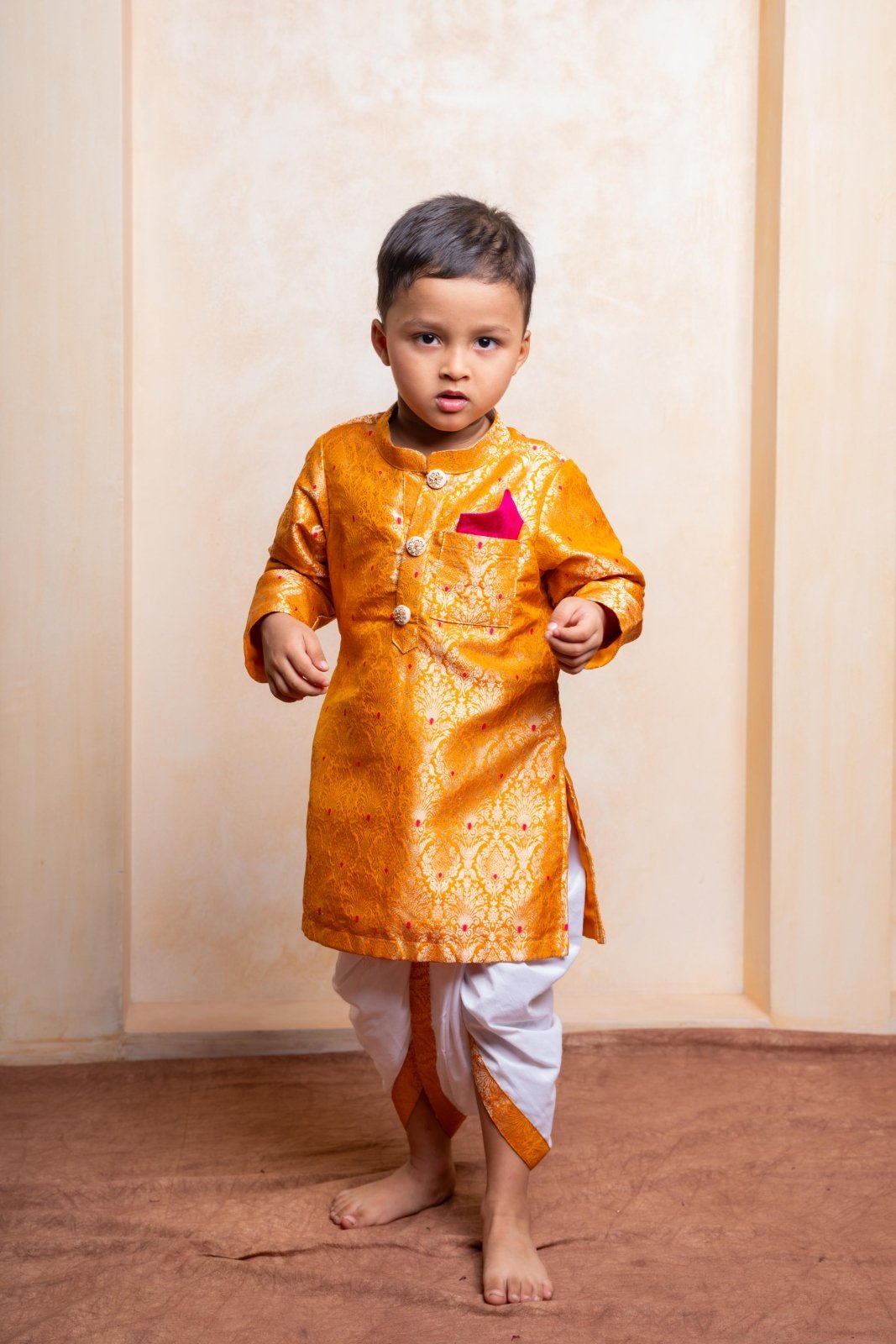 Royal golden silk kurta with traditional dhoti – a perfect festive outfit for boys to shine at weddings and celebrations - Kirti Agarwal