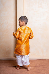 Royal golden silk kurta with traditional dhoti – a perfect festive outfit for boys to shine at weddings and celebrations - Kirti Agarwal