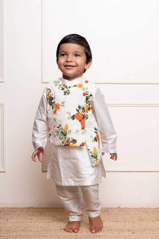 Stylish white kurta set with a attached vibrant floral asymmetrical jacket for a festive and modern look - Kirti Agarwal