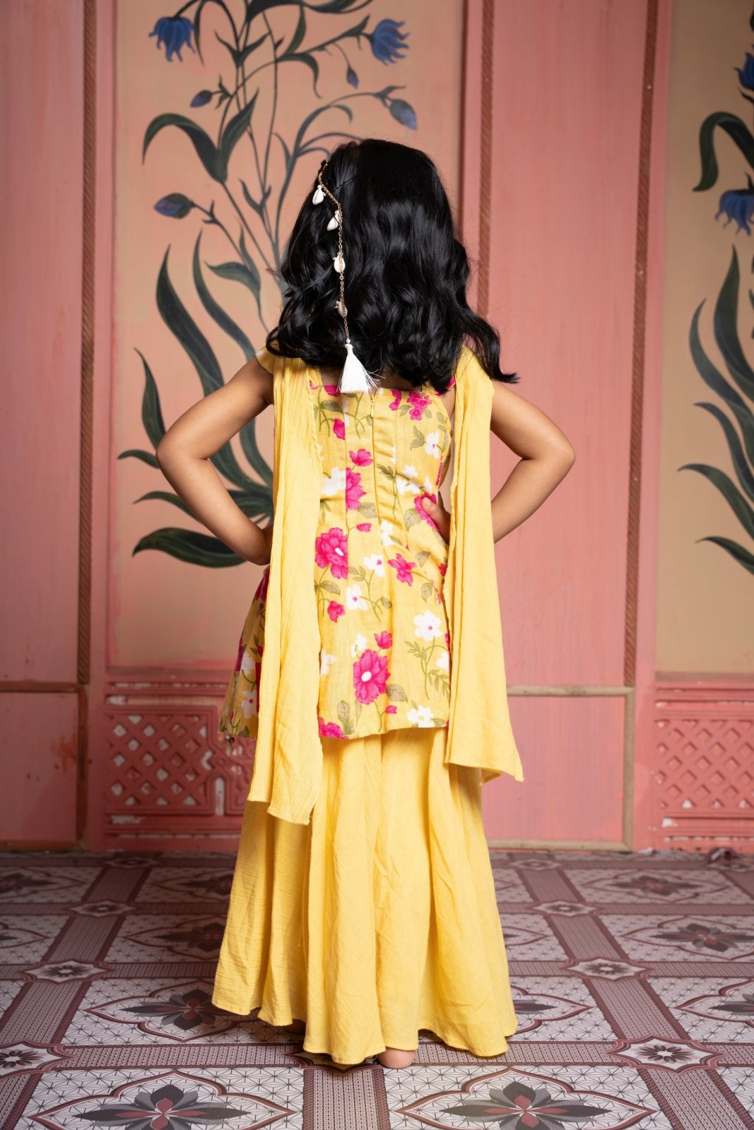 Sunny yellow floral peplum set with flared skirt and tassel dupatta—made for festive joy! - Kirti Agarwal