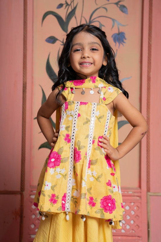Sunny yellow floral peplum set with flared skirt and tassel dupatta—made for festive joy! - Kirti Agarwal