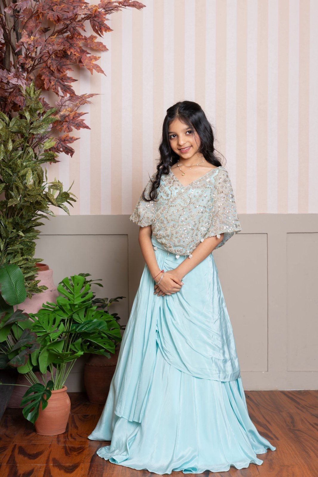 Twirl into elegance with this dreamy sea green cape top and lehenga set, perfect for festive flair. - Kirti Agarwal