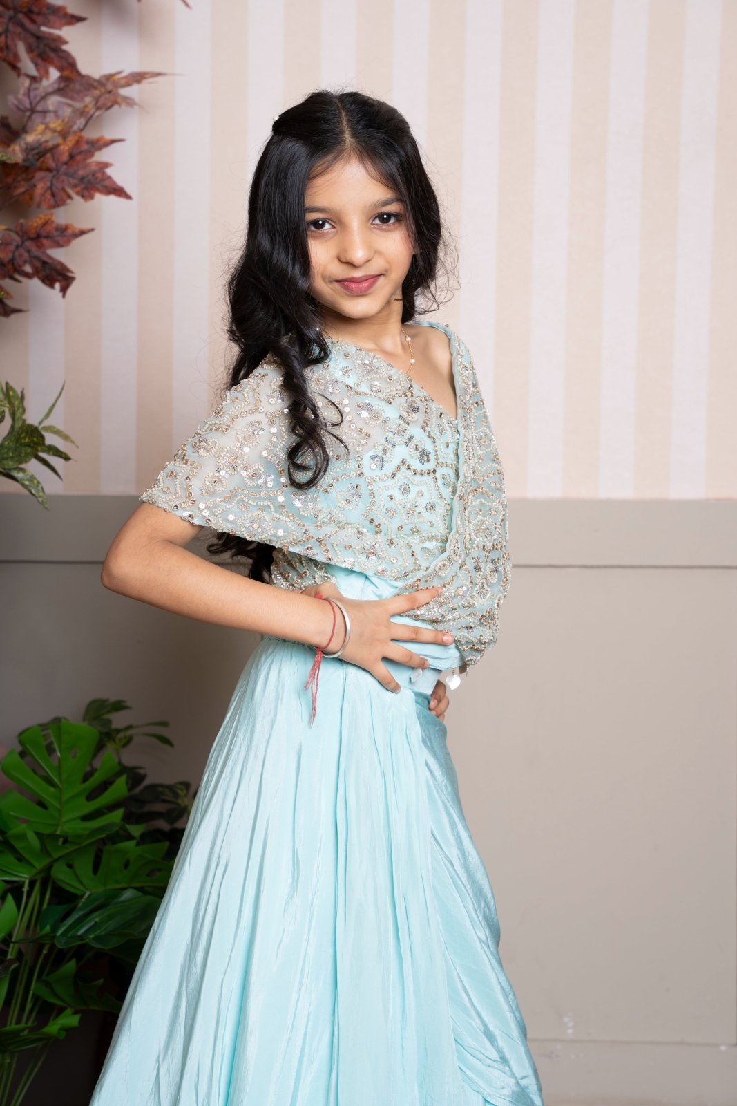 Twirl into elegance with this dreamy sea green cape top and lehenga set, perfect for festive flair. - Kirti Agarwal