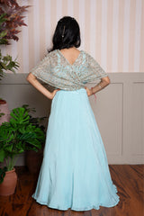 Twirl into elegance with this dreamy sea green cape top and lehenga set, perfect for festive flair. - Kirti Agarwal