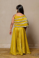 Vibrant golden - yellow ensemble with an asymmetrical top and wide - legged pants, perfect for making a bold statement at any festive occasion. - Kirti Agarwal