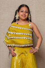 Vibrant golden - yellow ensemble with an asymmetrical top and wide - legged pants, perfect for making a bold statement at any festive occasion. - Kirti Agarwal