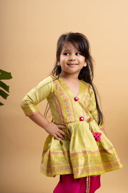 Vibrant lime Green printed kurta paired with bold fuchsia dhoti pants for a festive and playful look - Kirti Agarwal