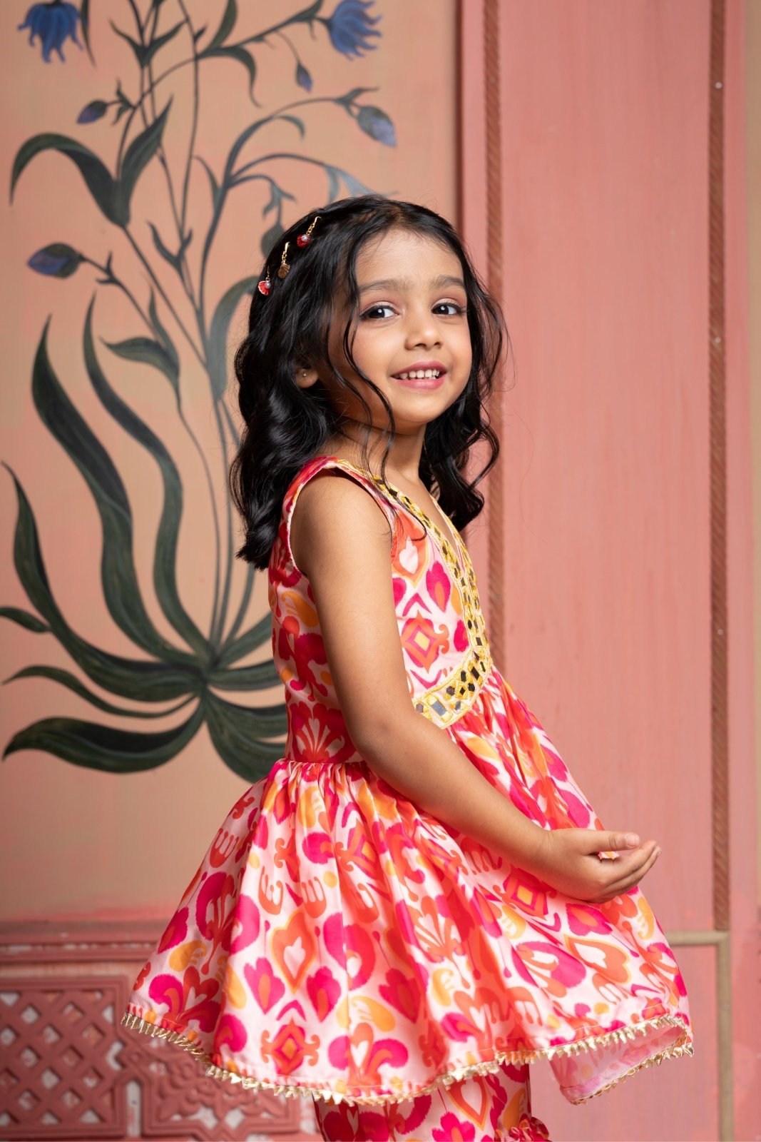 Vibrant printed kurti - sharara set with mirror work and gold accents—perfect for festive celebrations. - Kirti Agarwal