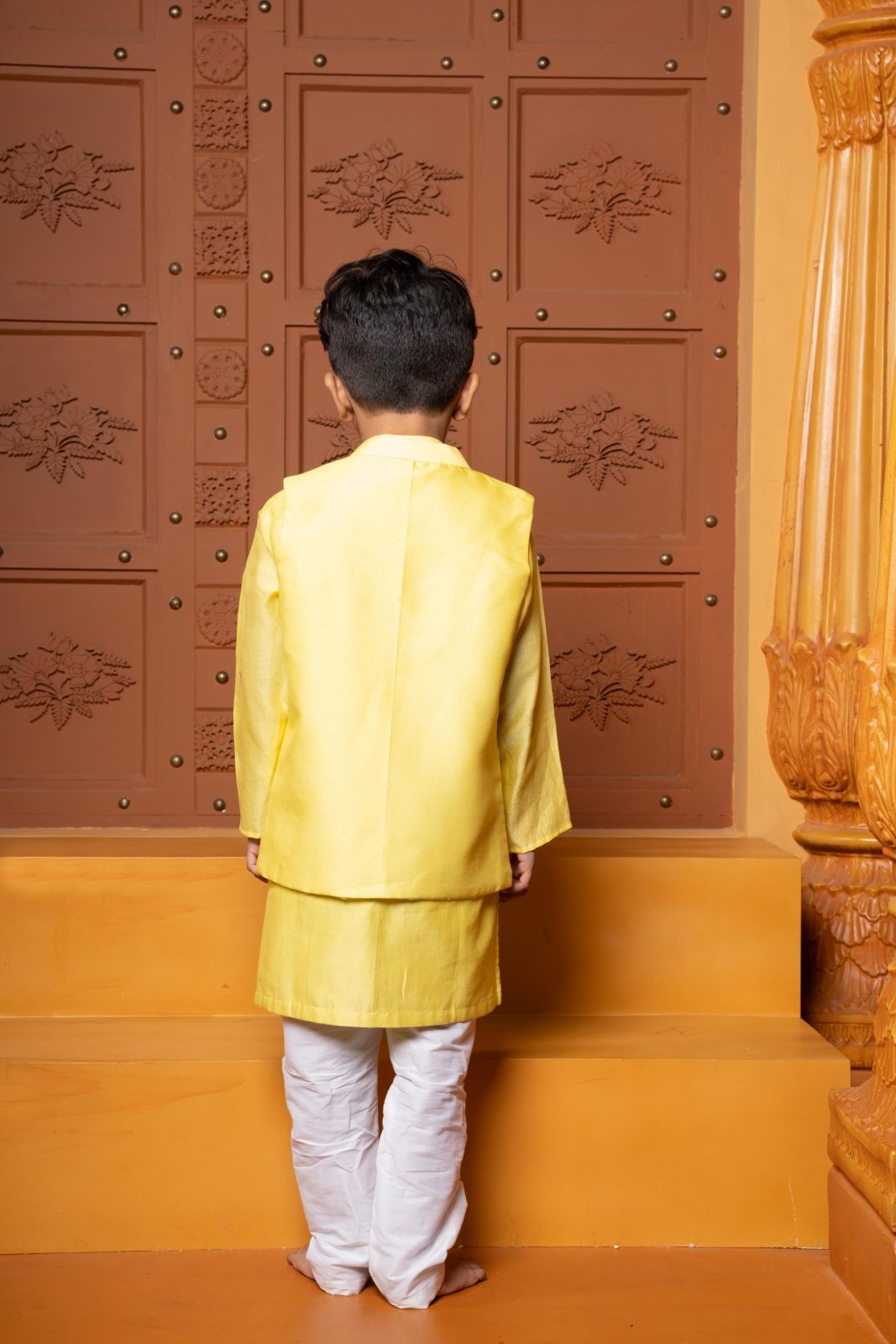 Yellow Kurta With Embroidered Jacket And White Pyjama - Kirti Agarwal