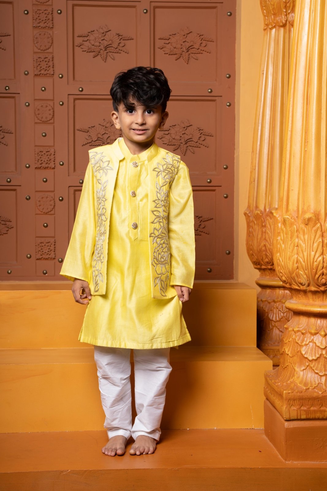 Yellow Kurta With Embroidered Jacket And White Pyjama - Kirti Agarwal