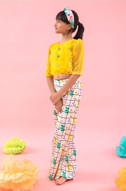 Stylish Scalaped Yellow Organza top with multicolour pants - Kirti Agarwal