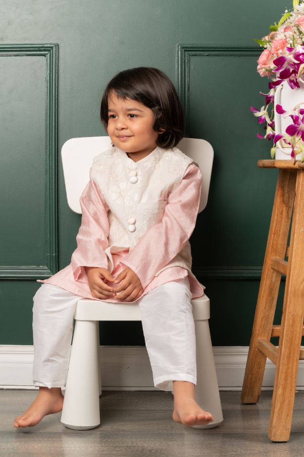 White embroidered Nehru Jacket with pink chanderi silk kurta and chudidar - Kirti Agarwal